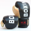 Gants de boxe conçu pour la performance et la durabilité en entraînement couleur noir et doré